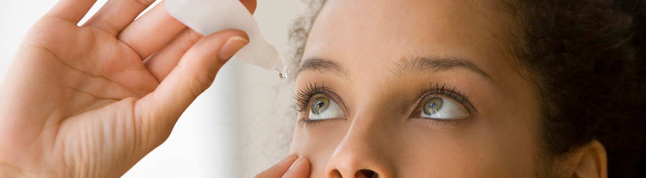 Woman using Prostaglandin Analogues Eye Drops for Glaucoma