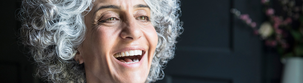 Woman laughing after Glaucoma Treatment
